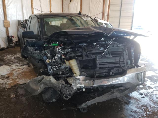 CHEVROLET SILVERADO 2018 with VIN 1GCVKREC3JZ122811 - Photo from auction