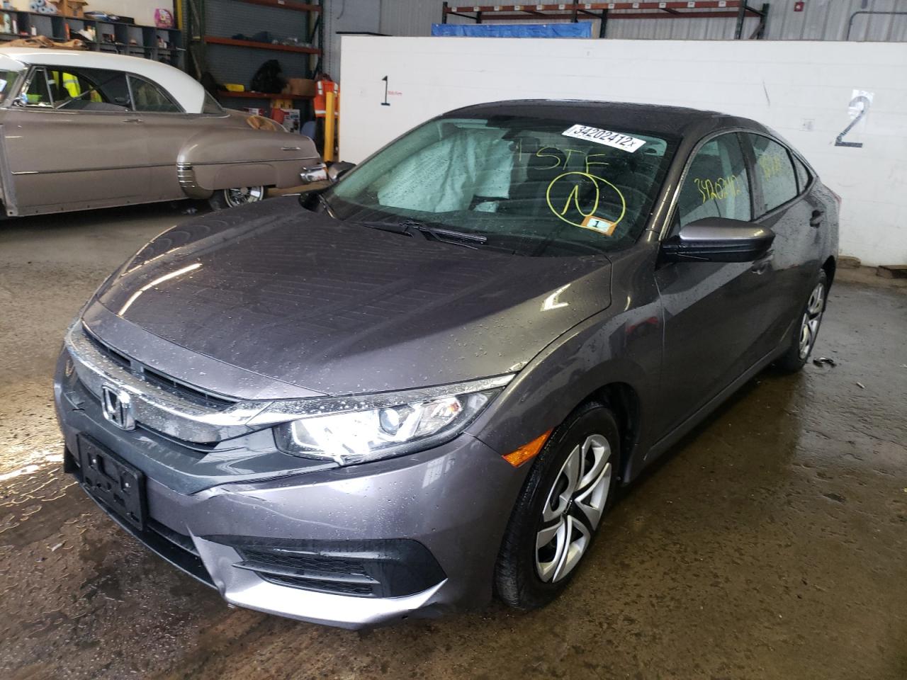 Photo 2 from auction – 2016 HONDA CIVIC LX with VIN 19XFC2F57GE224609