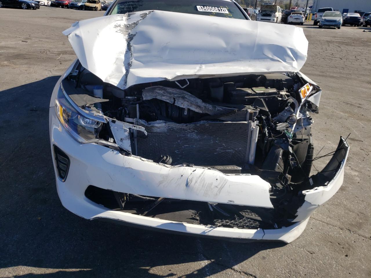 Photo 9 from auction – 2018 KIA OPTIMA LX with VIN 5XXGT4L30JG233069