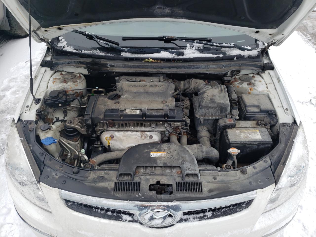 Photo 7 from auction – 2012 HYUNDAI ELANTRA TO with VIN KMHDC8AE5CU147652