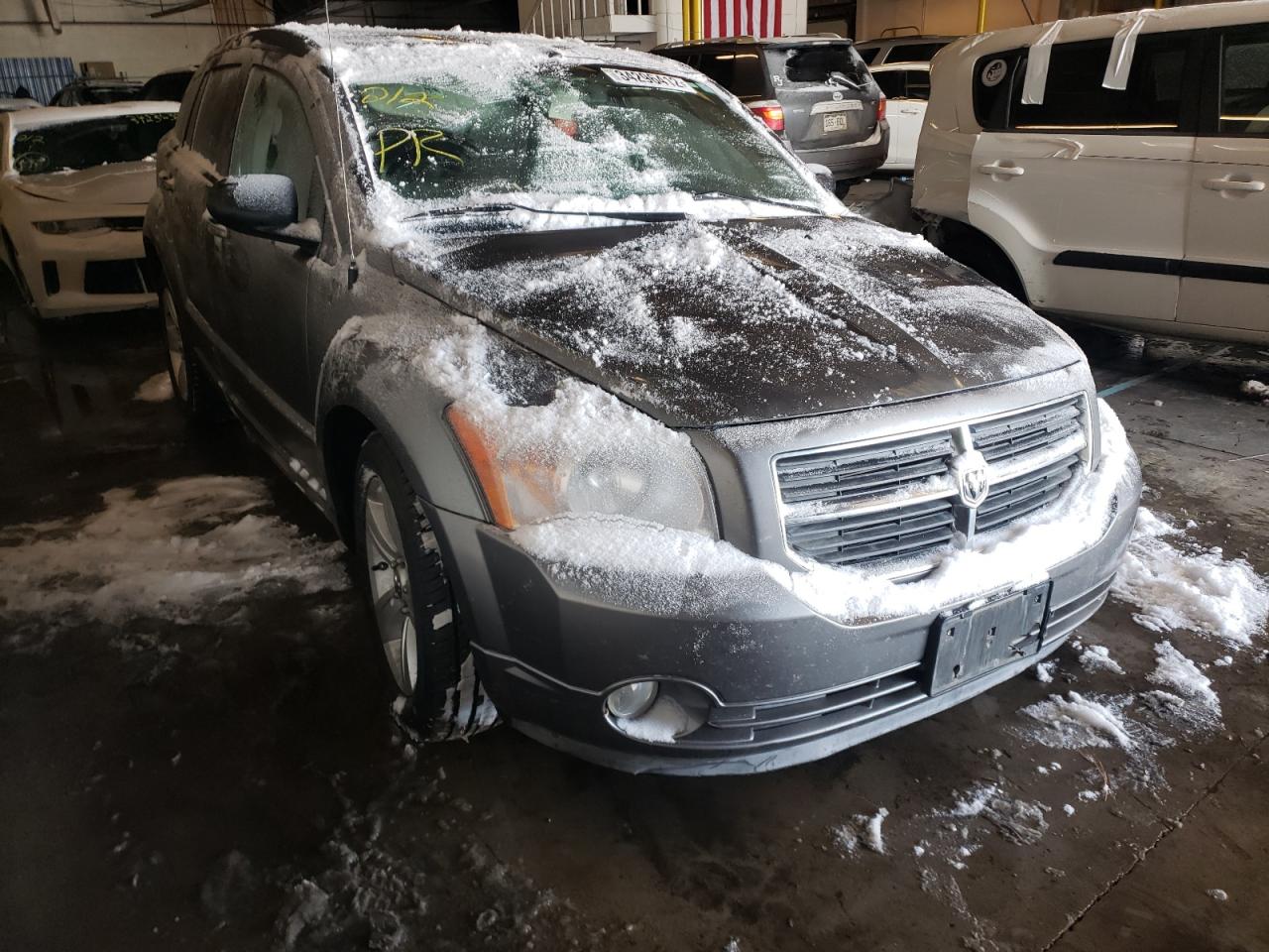 DODGE CALIBER MA 2011 with VIN 1B3CB3HA2BD255123 - Photo from auction