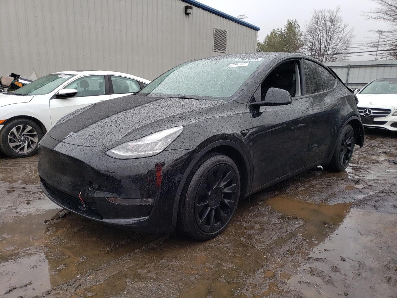 Photo 2 from auction – 2021 TESLA MODEL Y with VIN 5YJYGDEE4MF123995