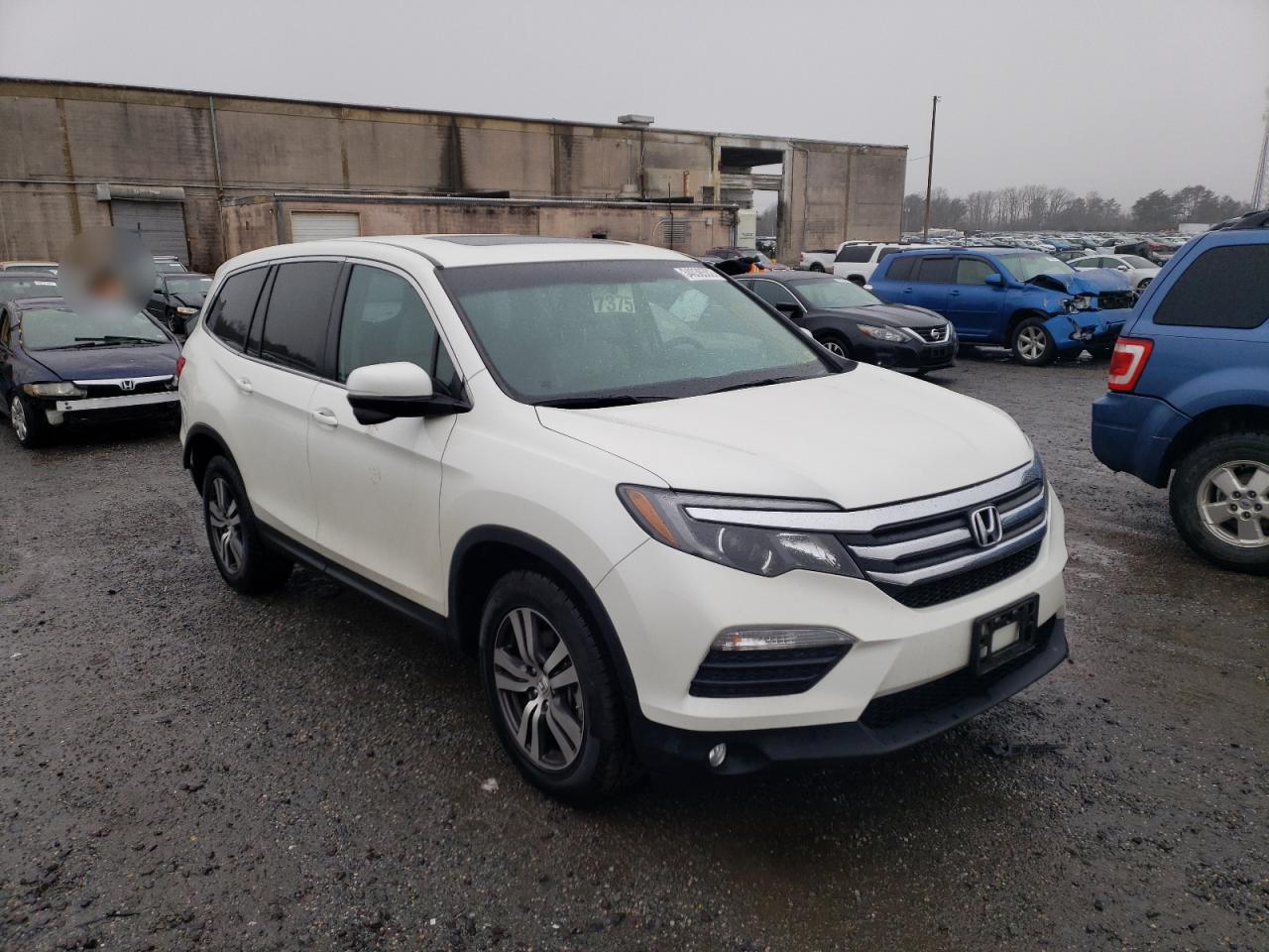 HONDA PILOT EXL 2016 with VIN 5FNYF6H52GB112654 - Photo from auction