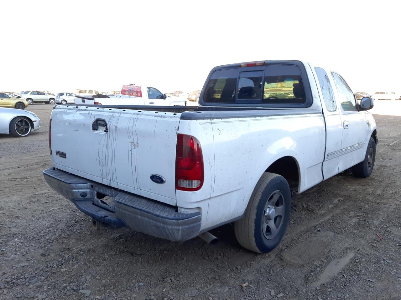 Photo 4 from auction – 2003 FORD F150 with VIN 1FTRX17W03NA37978