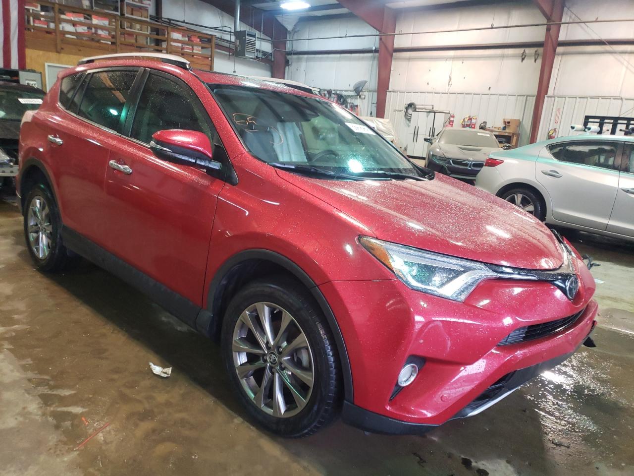 TOYOTA RAV4 LIMIT 2016 with VIN JTMYFREV2GJ072896 - Photo from auction