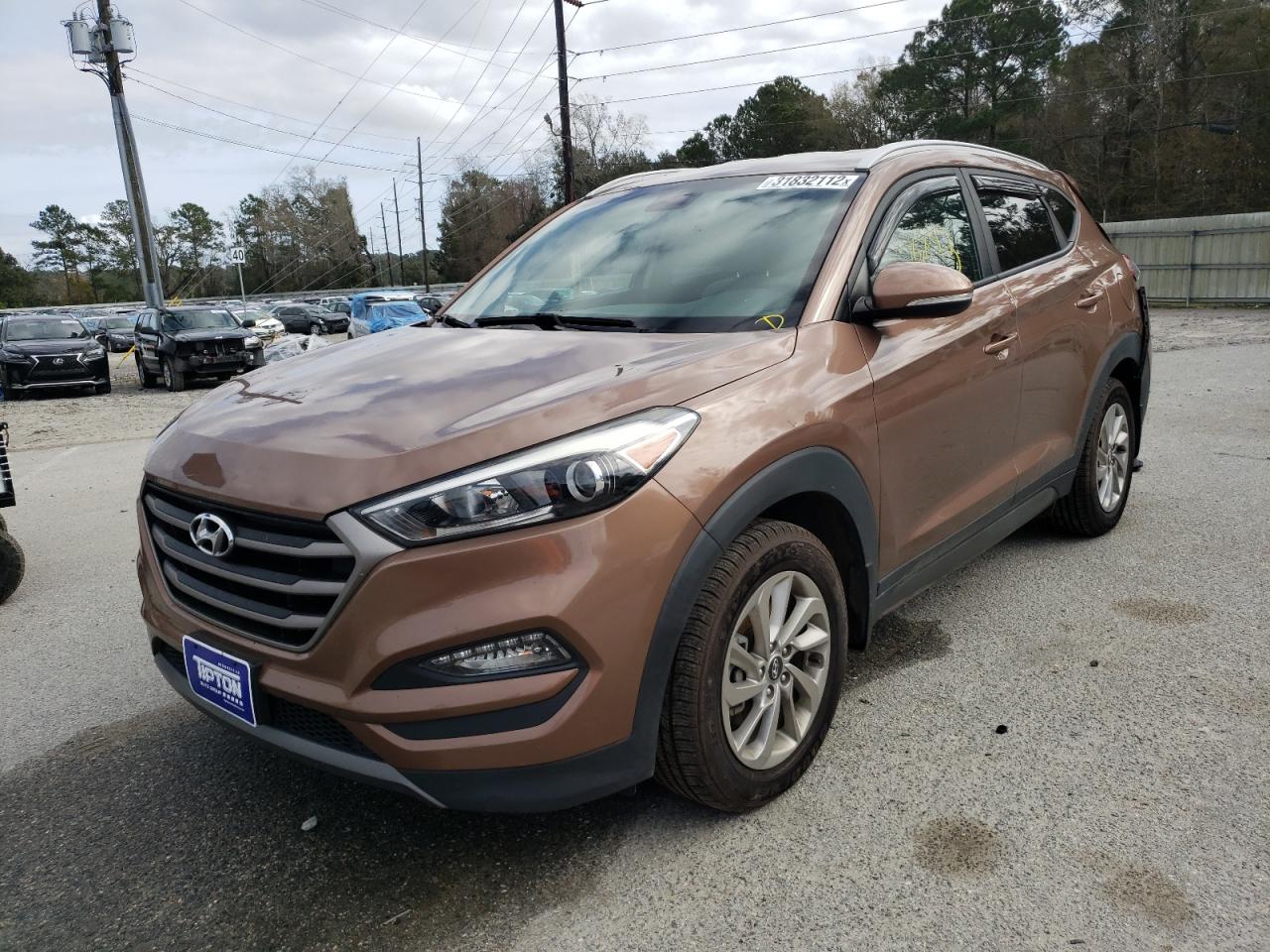 Photo 2 from auction – 2016 HYUNDAI TUCSON with VIN KM8J33A24GU242771