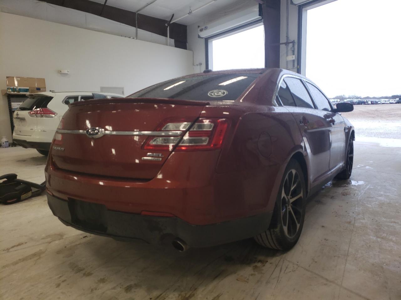 Photo 4 from auction – 2014 FORD TAURUS SEL with VIN 1FAHP2E81EG137476