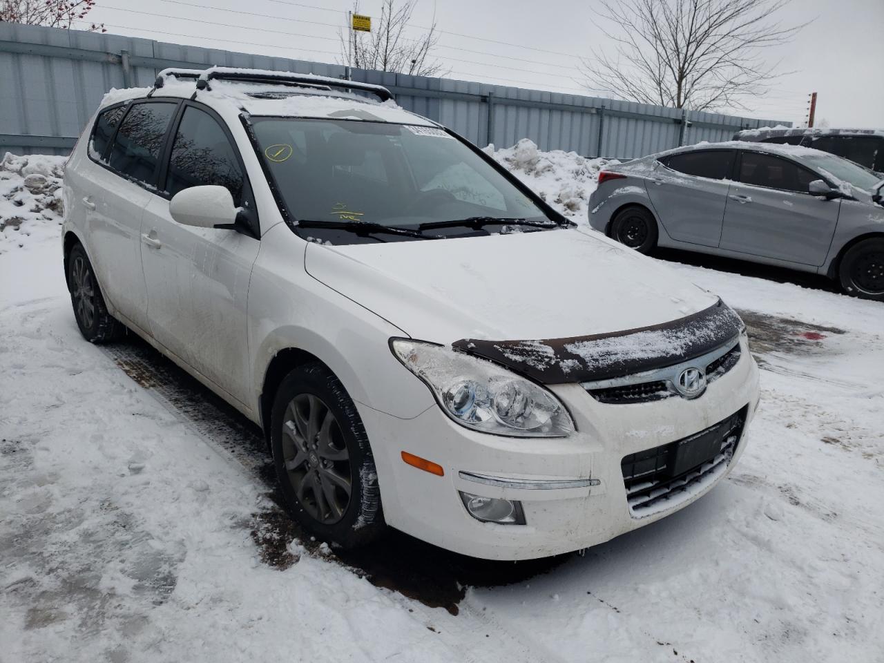 HYUNDAI ELANTRA TO 2012 with VIN KMHDC8AE5CU147652 - Photo from auction