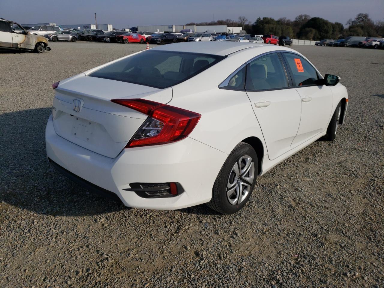 Photo 4 from auction – 2016 HONDA CIVIC LX with VIN 19XFC2F59GE236616