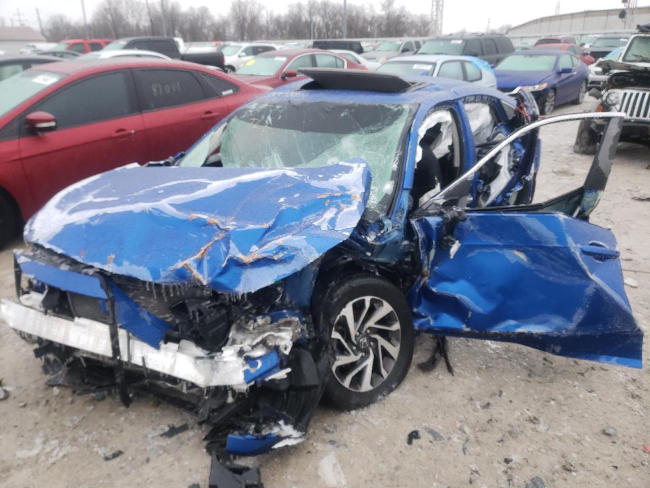 Photo 9 from auction – 2018 HONDA CIVIC EX with VIN 2HGFC2F75JH577669