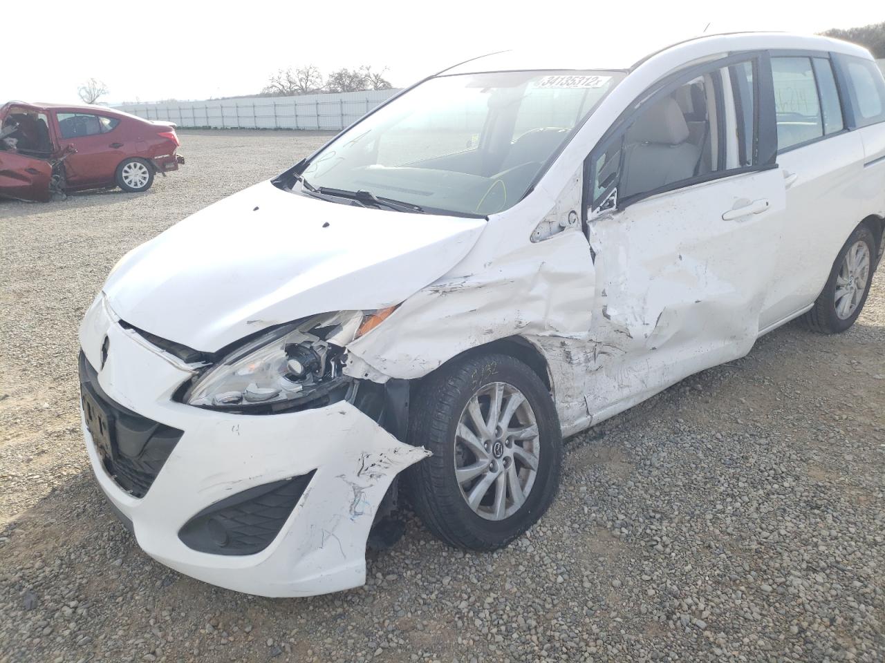 Photo 9 from auction – 2014 MAZDA 5 SPORT with VIN JM1CW2BL6E0168344