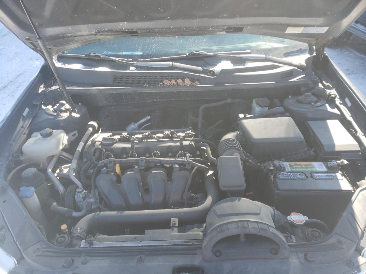 Photo 7 from auction – 2009 KIA OPTIMA LX with VIN KNAGE228195295878
