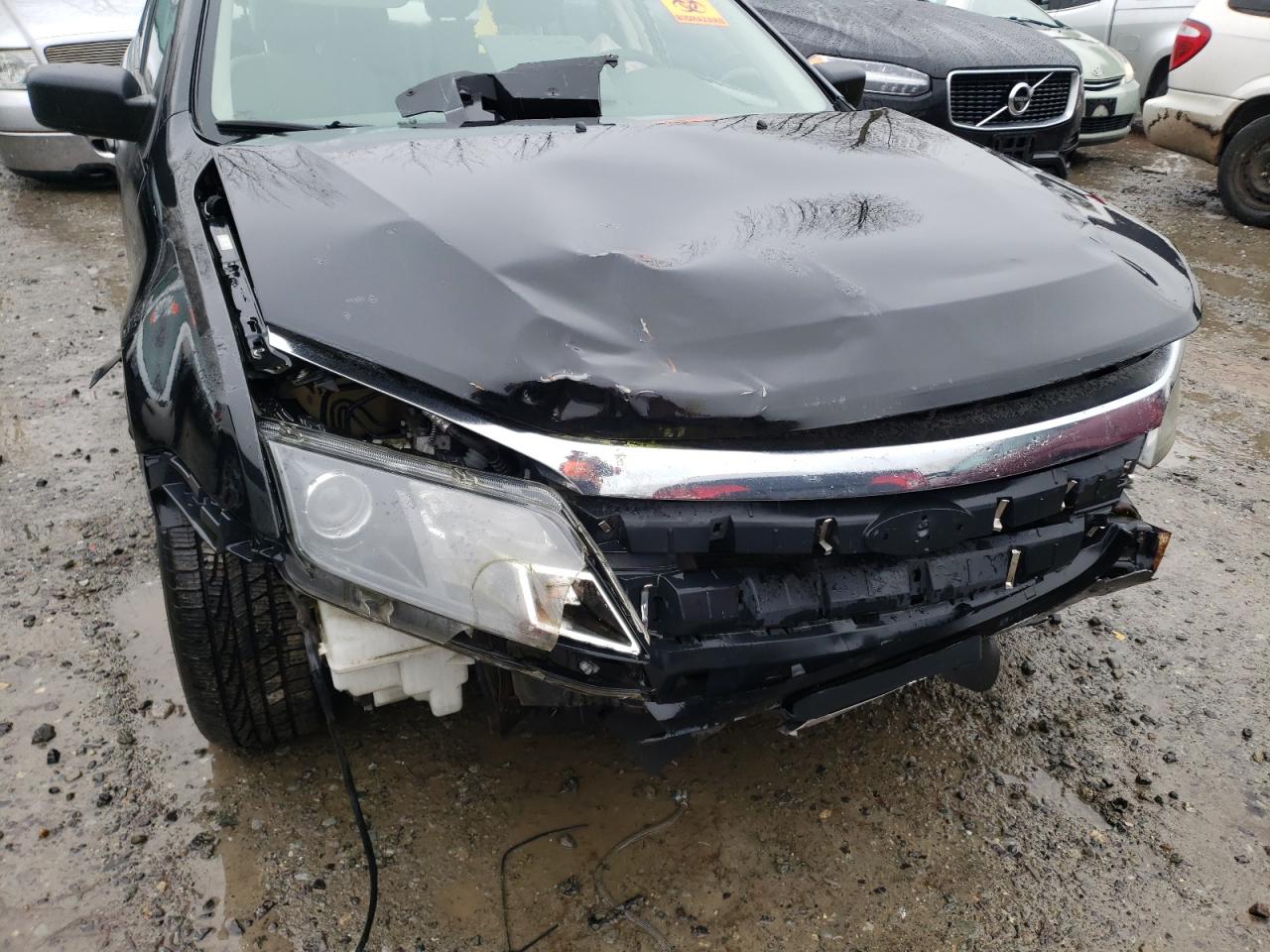 Foto 9 de la subasta – 2011 FORD FUSION S con VIN 3FAHP0GA3BR268191