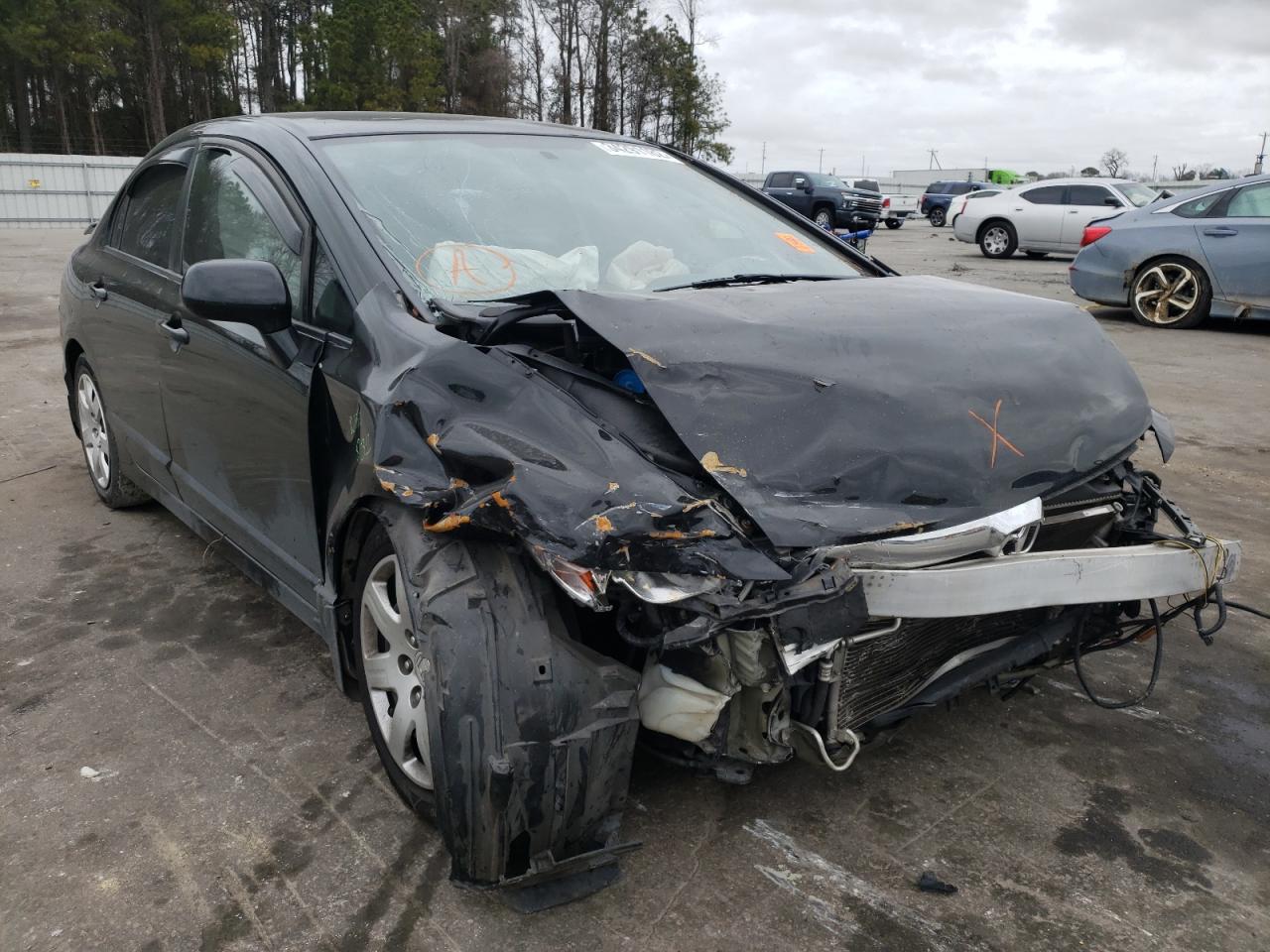HONDA CIVIC LX 2011 with VIN 19XFA1F54BE039037 - Photo from auction