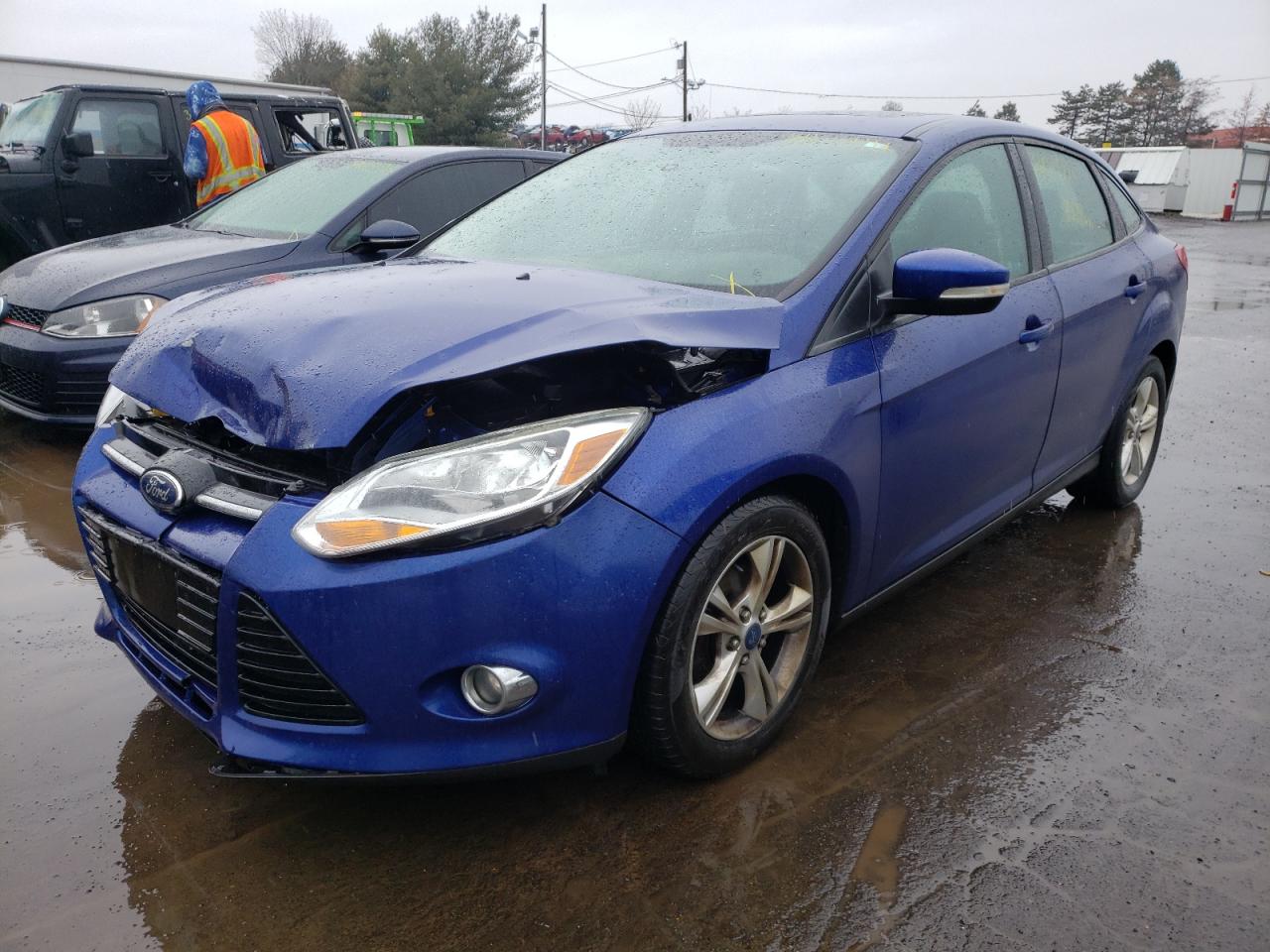 Photo 2 from auction – 2012 FORD FOCUS SE with VIN 1FAHP3F21CL425759
