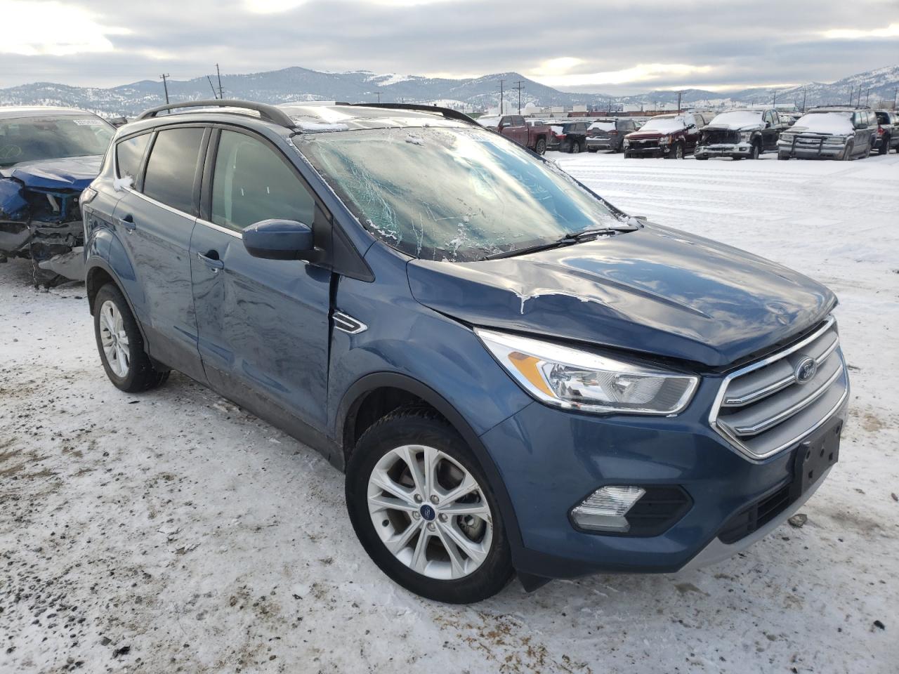 FORD ESCAPE SE 2018 with VIN 1FMCU9GD6JUC35359 - Photo from auction