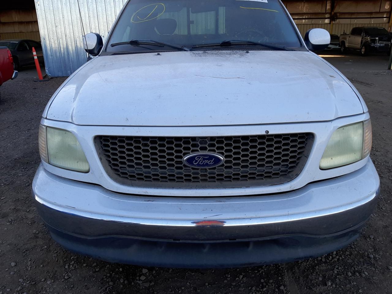 Photo 9 from auction – 2003 FORD F150 with VIN 1FTRX17W03NA37978