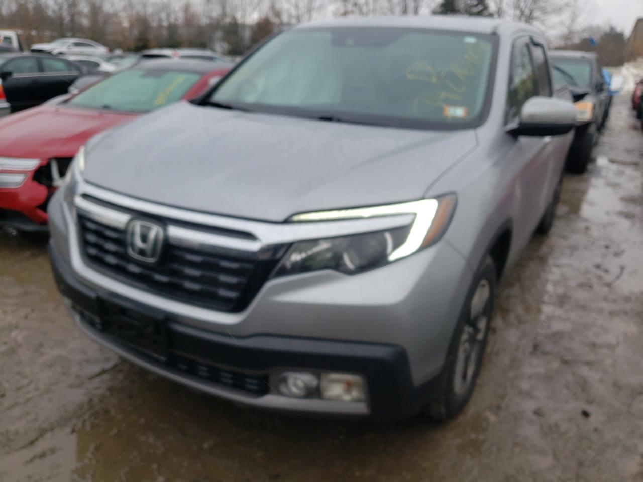 Photo 2 from auction – 2019 HONDA RIDGELINE with VIN 5FPYK3F73KB004560