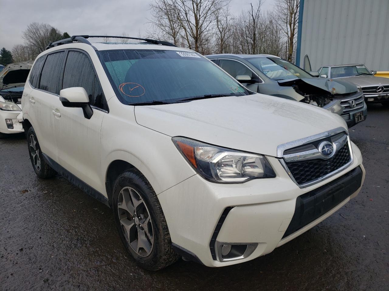 SUBARU FORESTER 2 2014 with VIN JF2SJGMC4EH444432 - Photo from auction