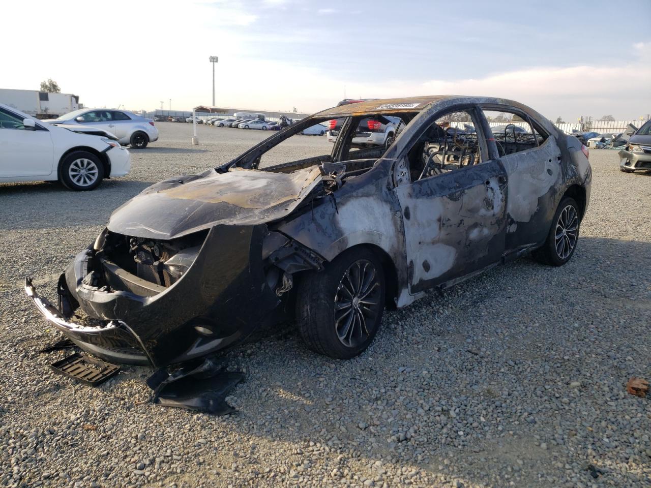 Photo 2 from auction – 2016 TOYOTA COROLLA L with VIN 5YFBURHE0GP475374