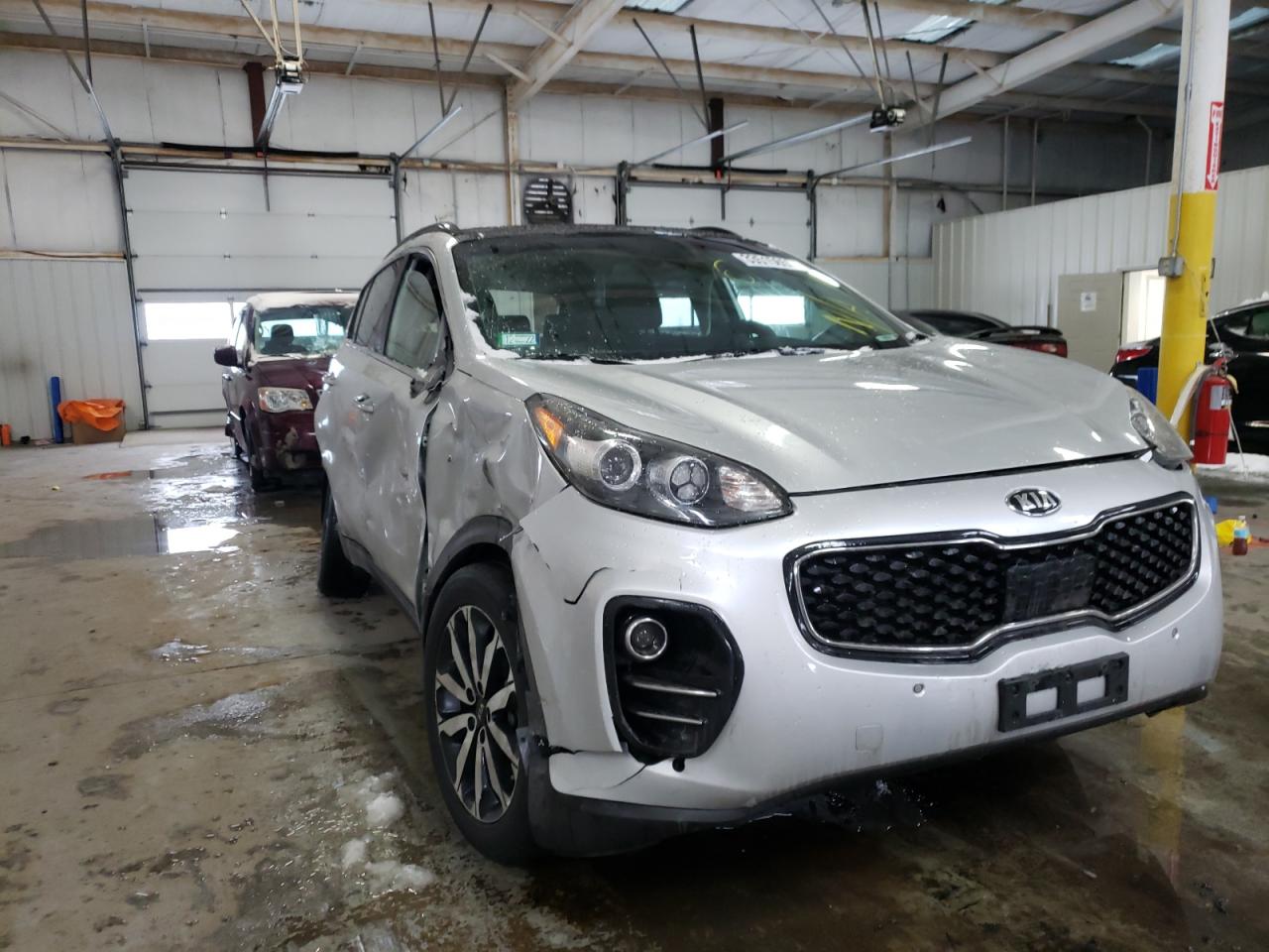 KIA SPORTAGE E 2018 with VIN KNDPNCAC9J7405096 - Photo from auction