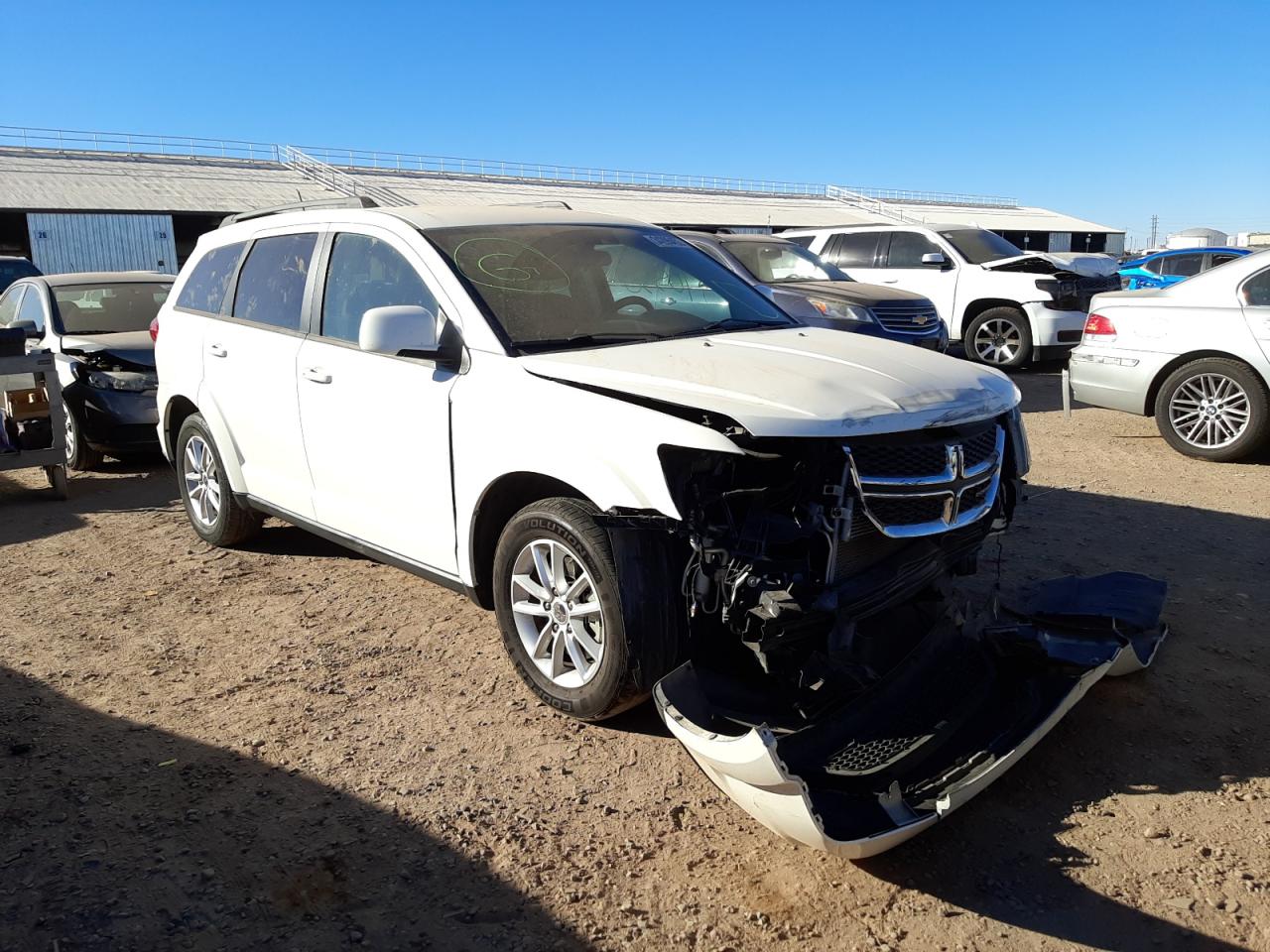 DODGE JOURNEY 2014 with VIN 3C4PDCBBXET141977 - Photo from auction