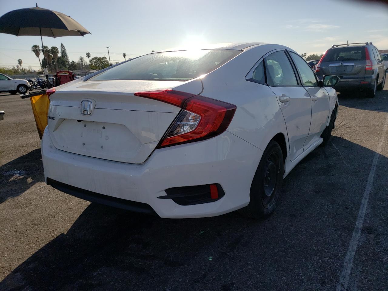 Photo 4 from auction – 2017 HONDA CIVIC LX with VIN 2HGFC2F50HH505044