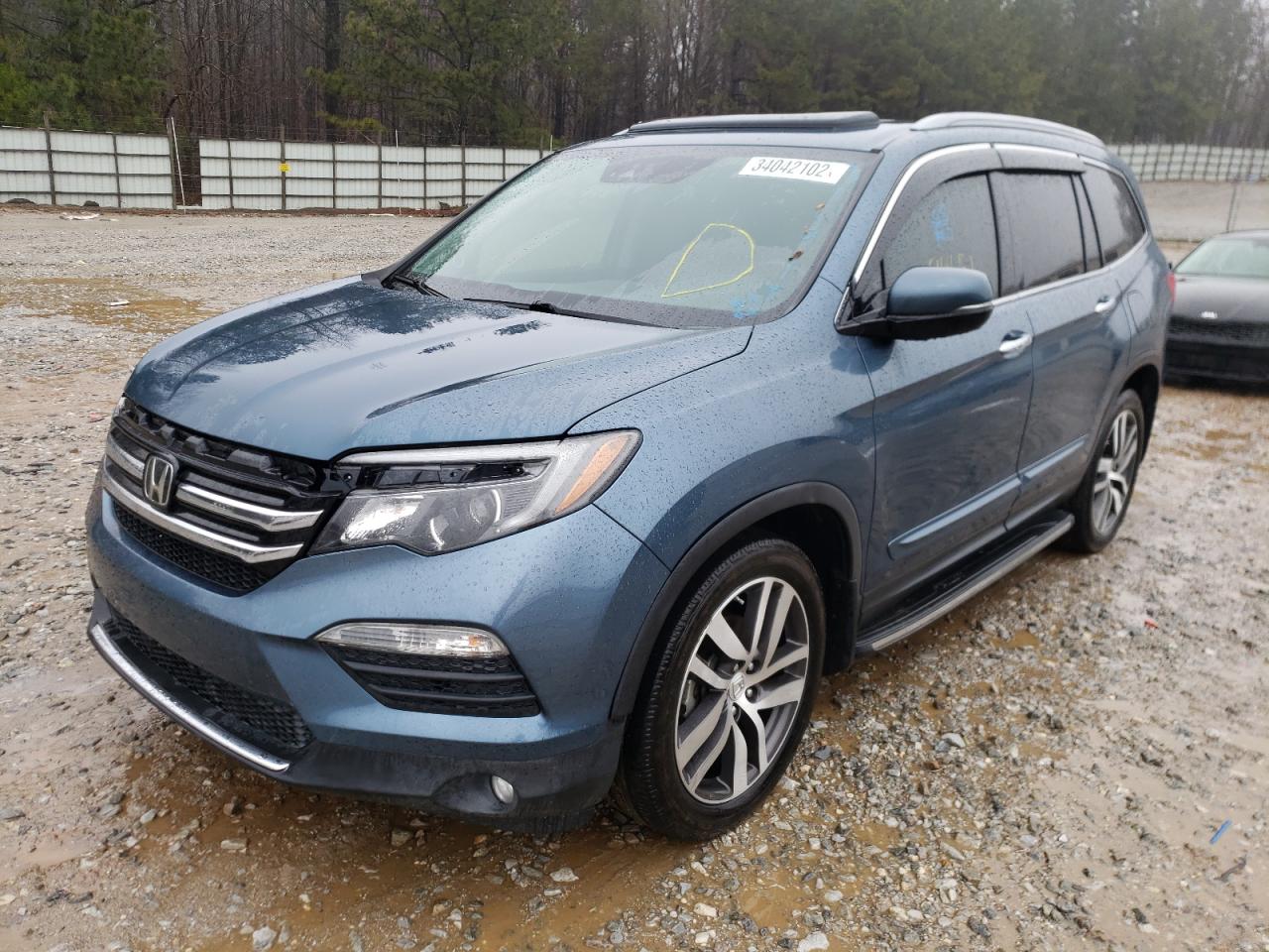 Photo 2 from auction – 2016 HONDA PILOT ELIT with VIN 5FNYF6H09GB115572