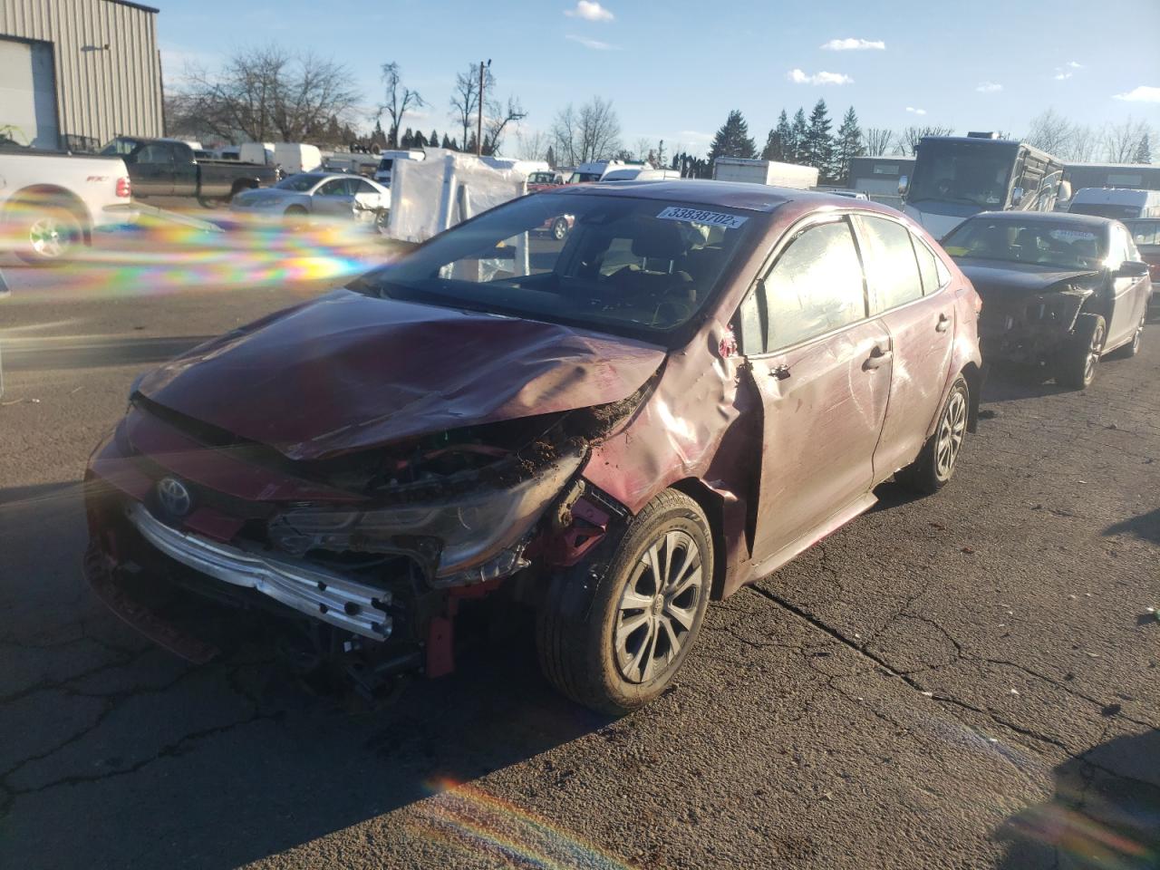 Photo 2 from auction – 2022 TOYOTA COROLLA LE with VIN JTDEAMDE3NJ040882