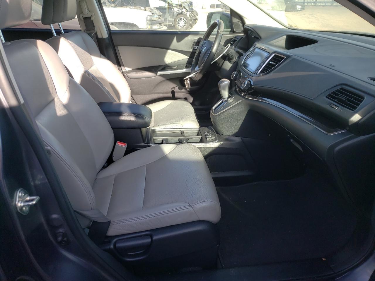 Photo 5 from auction – 2016 HONDA CR-V EXL with VIN 2HKRM4H77GH719599