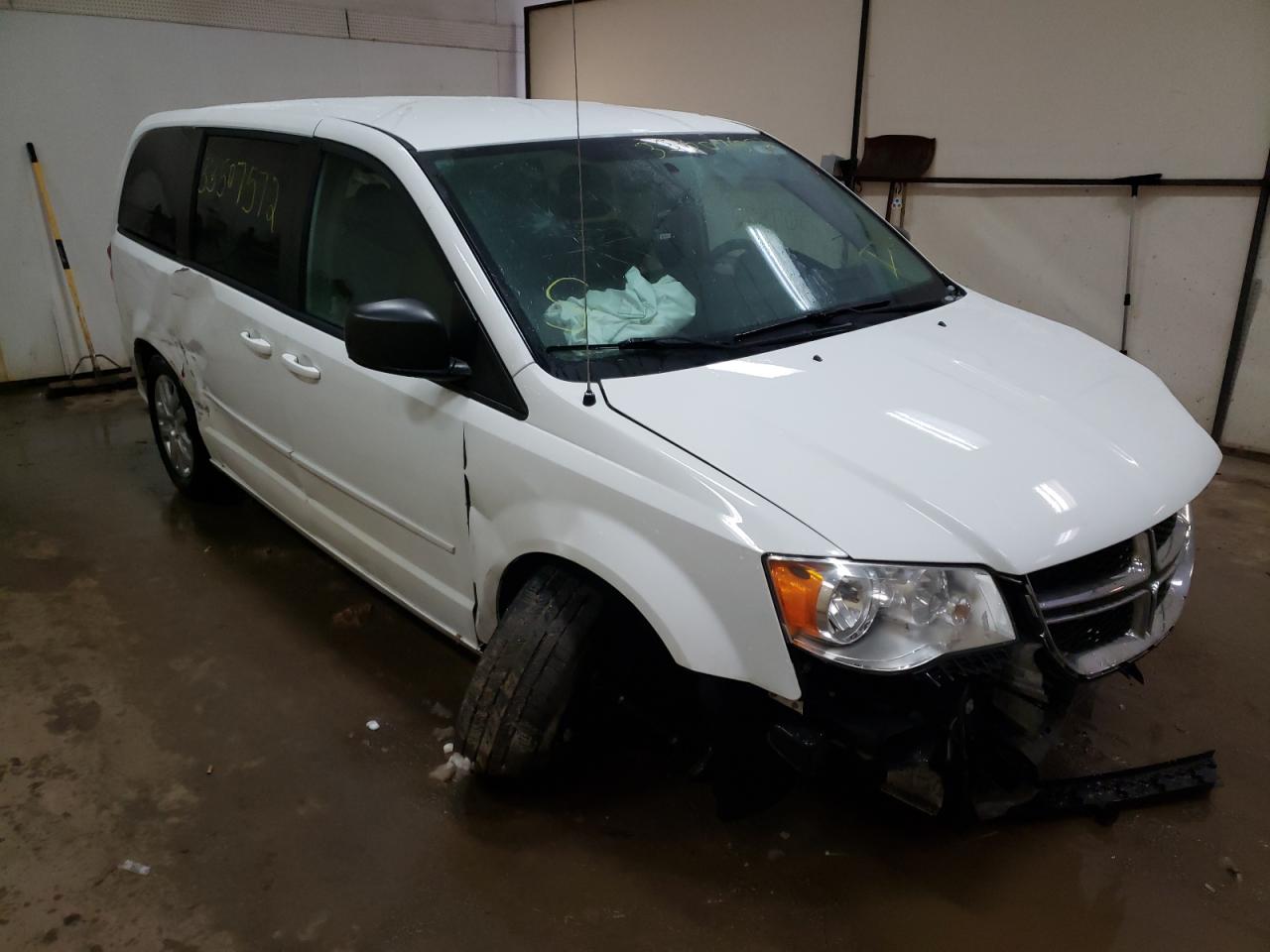 DODGE GRAND CARA 2015 with VIN 2C4RDGBG0FR658057 - Photo from auction