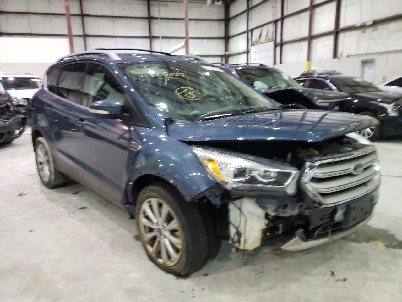 FORD ESCAPE TIT 2018 with VIN 1FMCU0J91JUC85182 - Photo from auction