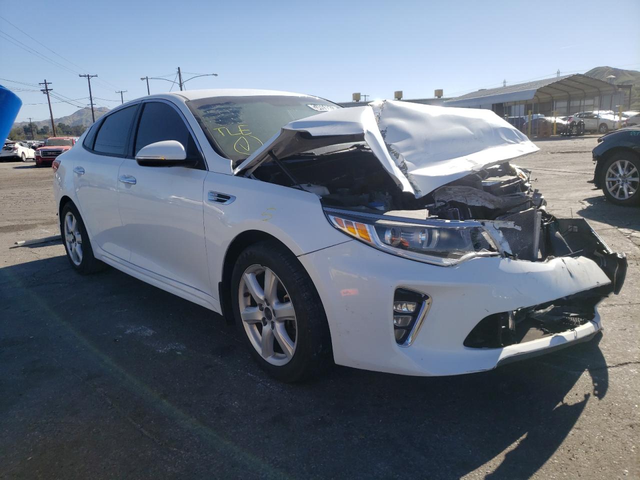 KIA OPTIMA LX 2018 with VIN 5XXGT4L30JG233069 - Photo from auction