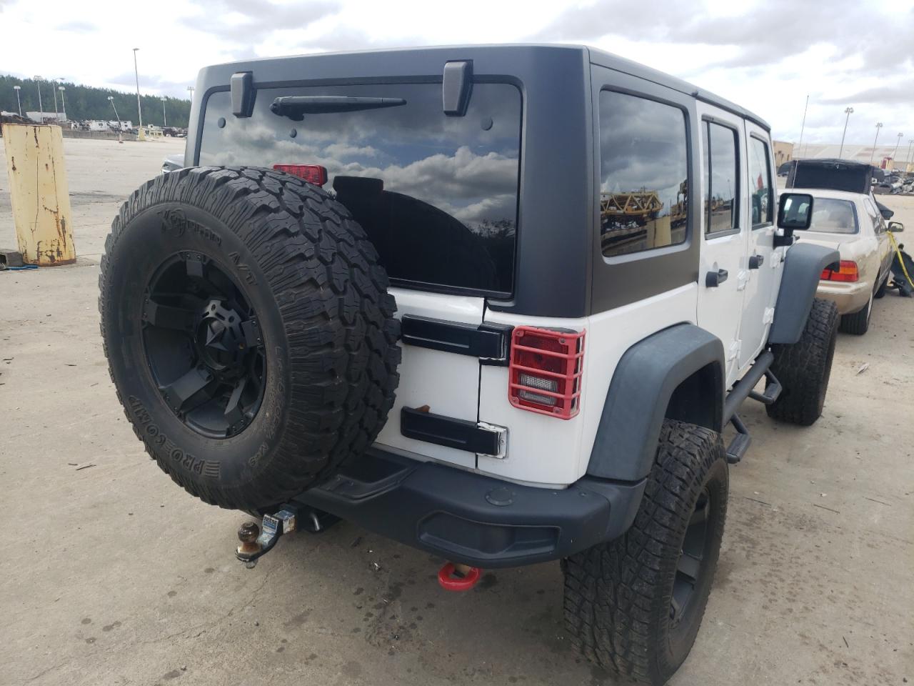 Photo 4 from auction – 2013 JEEP WRANGLER U with VIN 1C4HJWFG9DL664518
