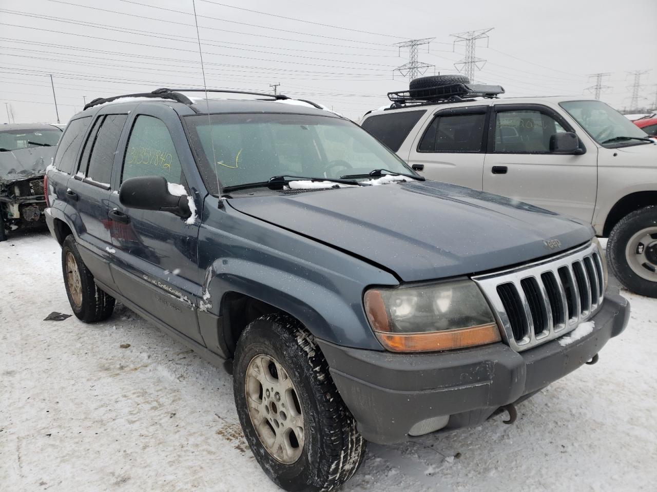 JEEP GRAND CHER 2001 with VIN 1J4GW48N71C698024 - Photo from auction