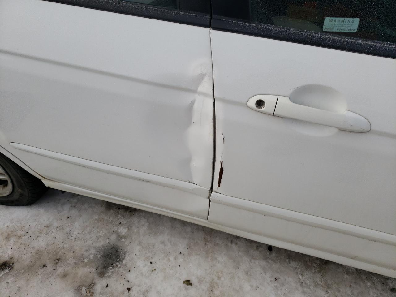Photo 9 from auction – 2005 KIA SPECTRA LX with VIN KNAFE121455193896