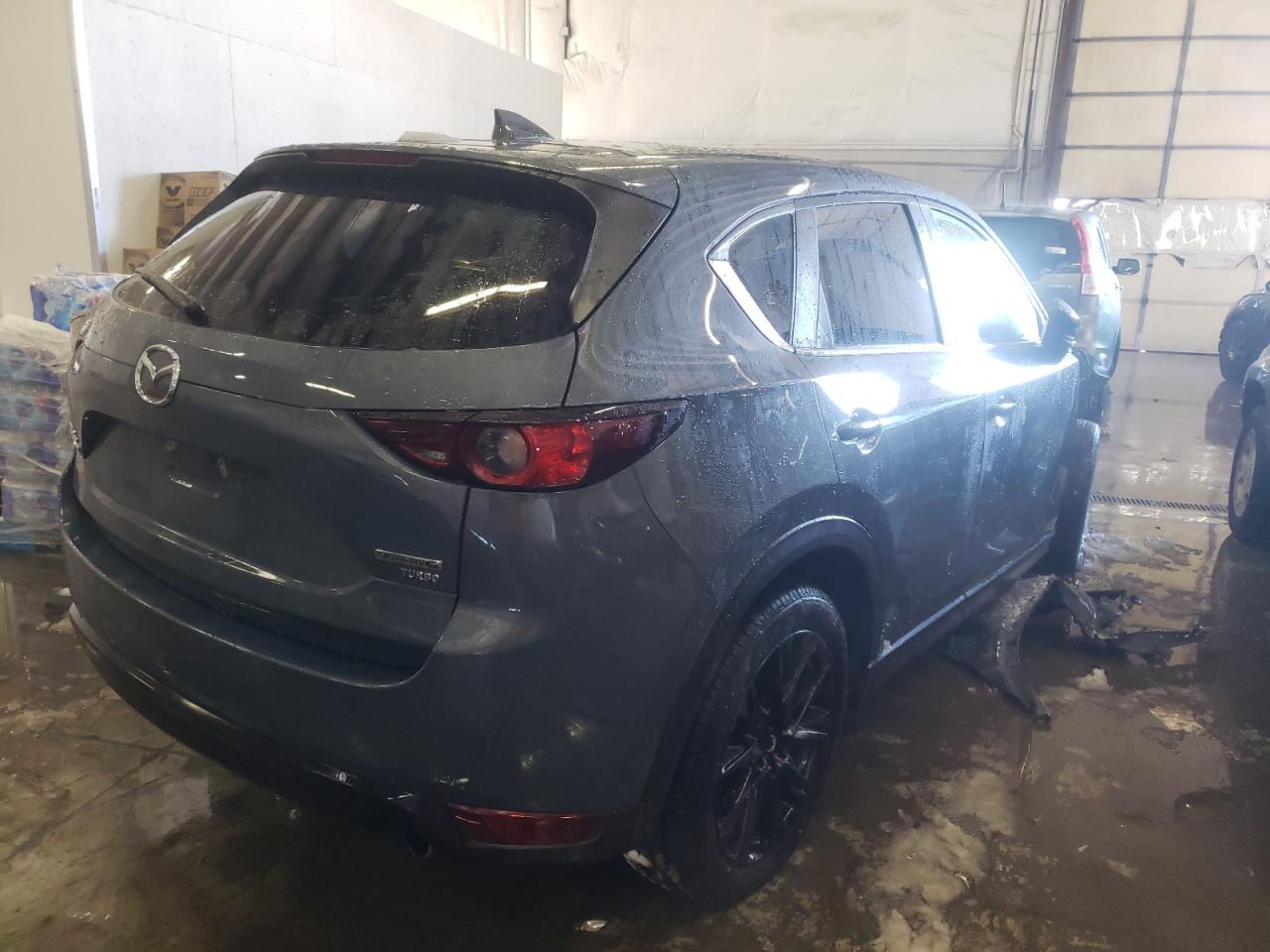 Photo 4 from auction – 2021 MAZDA CX-5 TOURI with VIN JM3KFBCY1M0415913