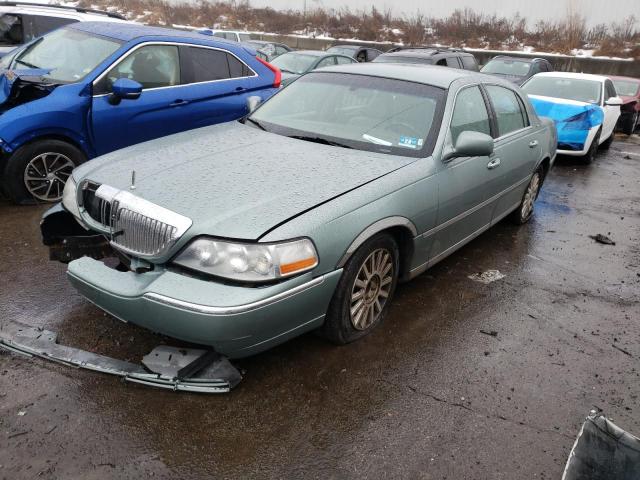 Photo 2 from auction – 2004 LINCOLN TOWN CAR E with VIN 1LNHM81W34Y675000