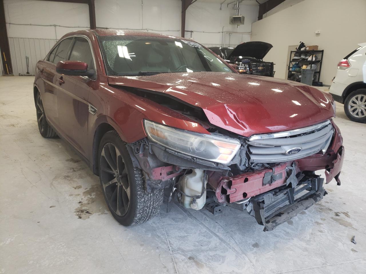 FORD TAURUS SEL 2014 with VIN 1FAHP2E81EG137476 - Photo from auction