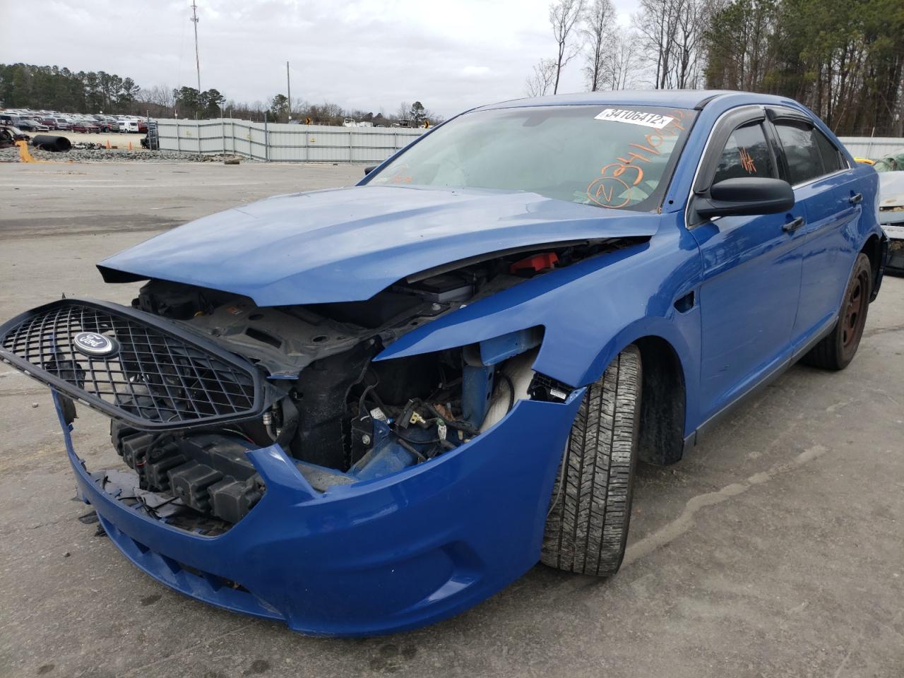 Photo 2 from auction – 2013 FORD TAURUS POL with VIN 1FAHP2MT9DG196344