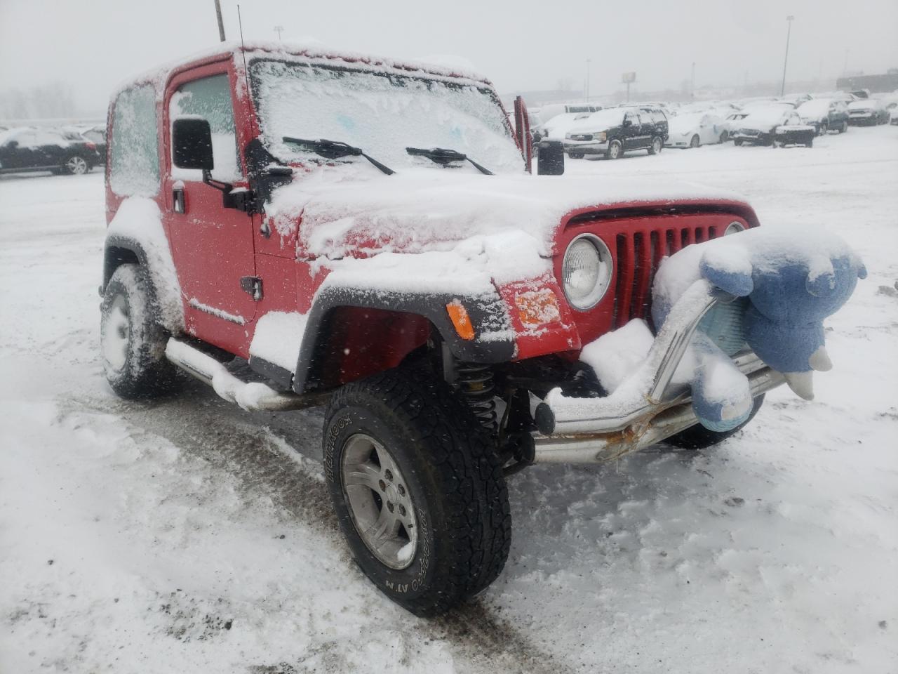 JEEP WRANGLER / 2000 with VIN 1J4FA49SXYP717182 - Photo from auction