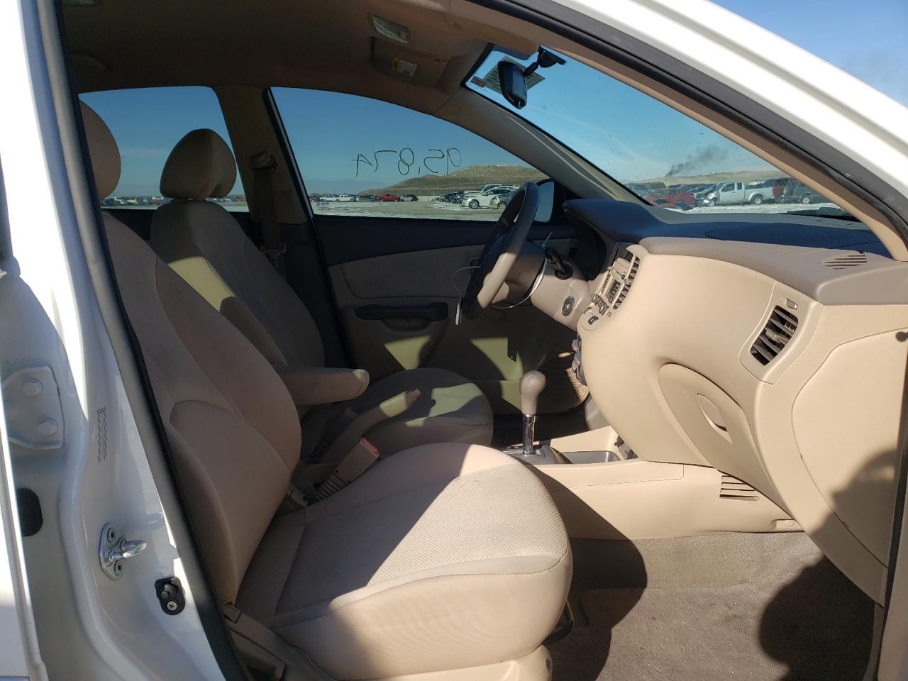 Photo 5 from auction – 2011 KIA RIO BASE with VIN KNADH4A33B6855928