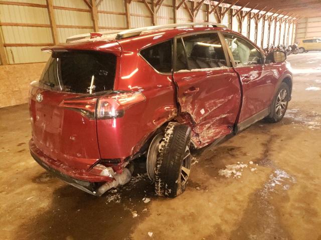 Photo 4 from auction – 2018 TOYOTA RAV4 LE with VIN 2T3ZFREV5JW456555