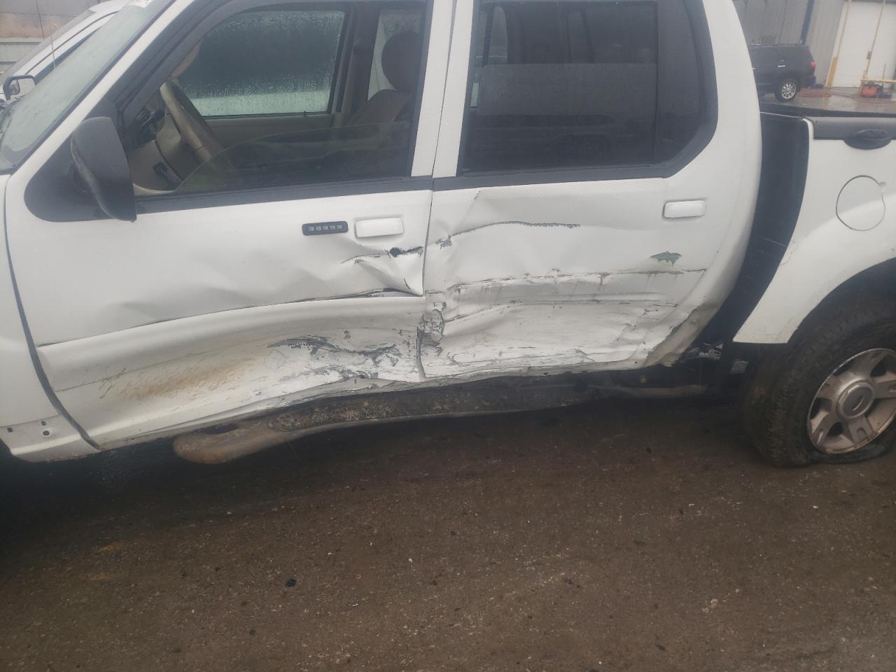 Photo 9 from auction – 2003 FORD EXPLORER S with VIN 1FMZU67E23UB74905