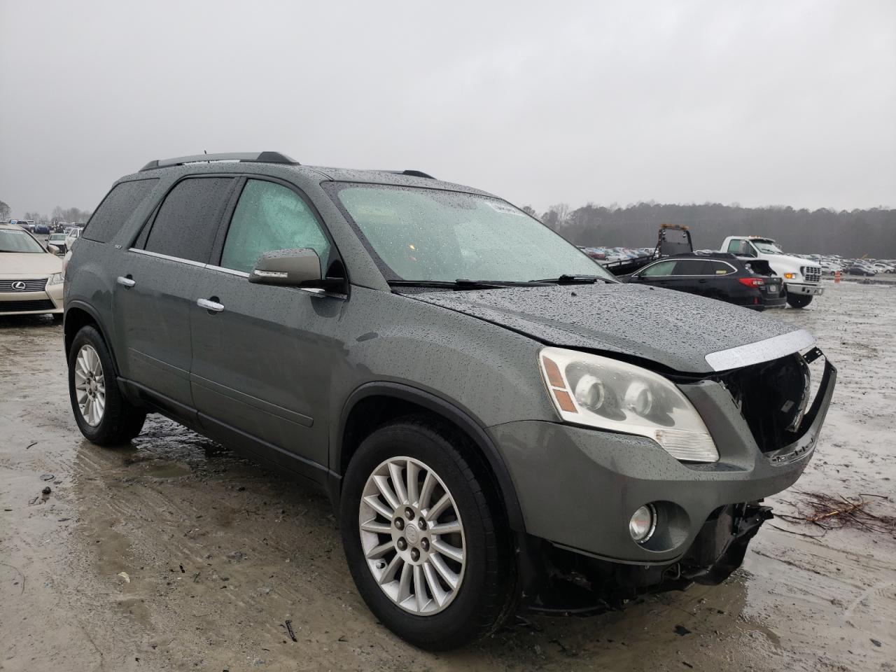 GMC ACADIA SLT 2011 with VIN 1GKKRRED9BJ244472 - Photo from auction