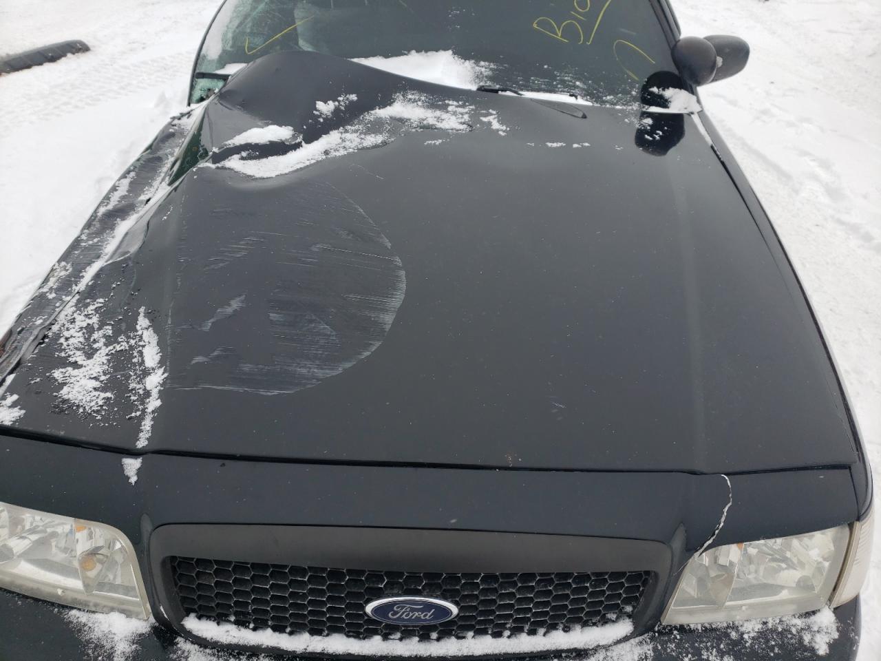 Photo 7 from auction – 2011 FORD CROWN VICT with VIN 2FABP7BV4BX143579