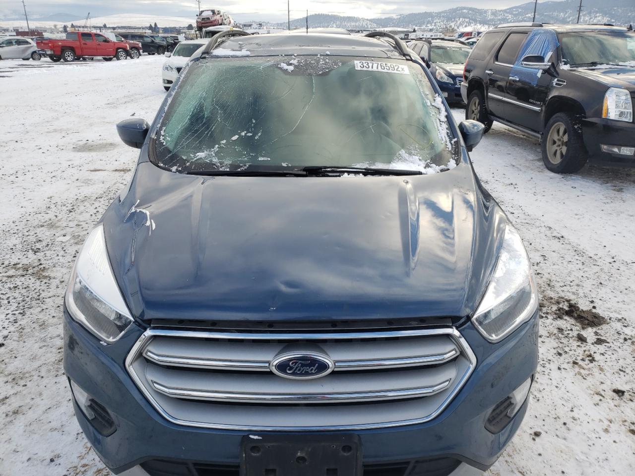 Photo 9 from auction – 2018 FORD ESCAPE SE with VIN 1FMCU9GD6JUC35359