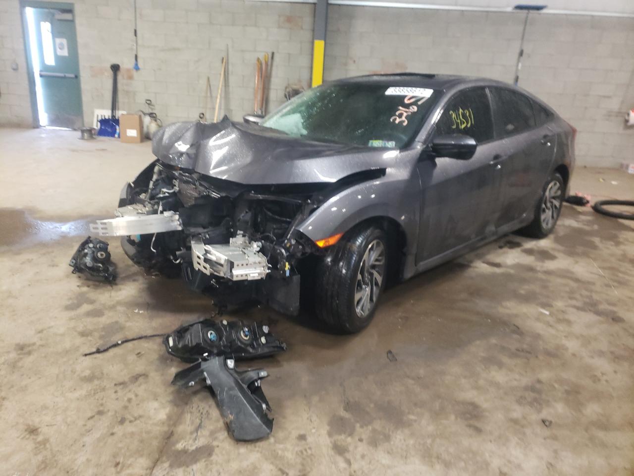 Photo 2 from auction – 2017 HONDA CIVIC EX with VIN 2HGFC2F70HH574480