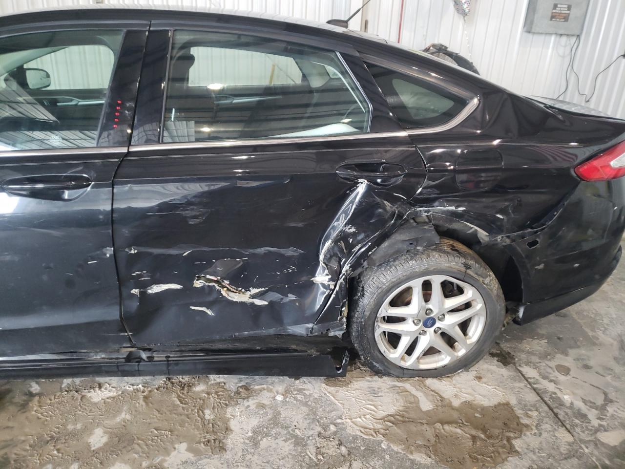 Photo 9 from auction – 2015 FORD FUSION SE with VIN 3FA6P0H70FR170848