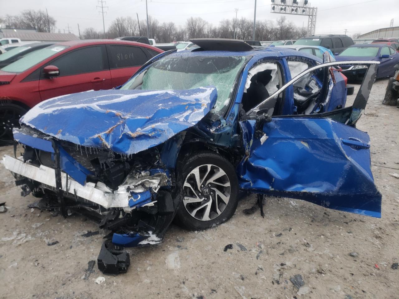 Photo 2 from auction – 2018 HONDA CIVIC EX with VIN 2HGFC2F75JH577669